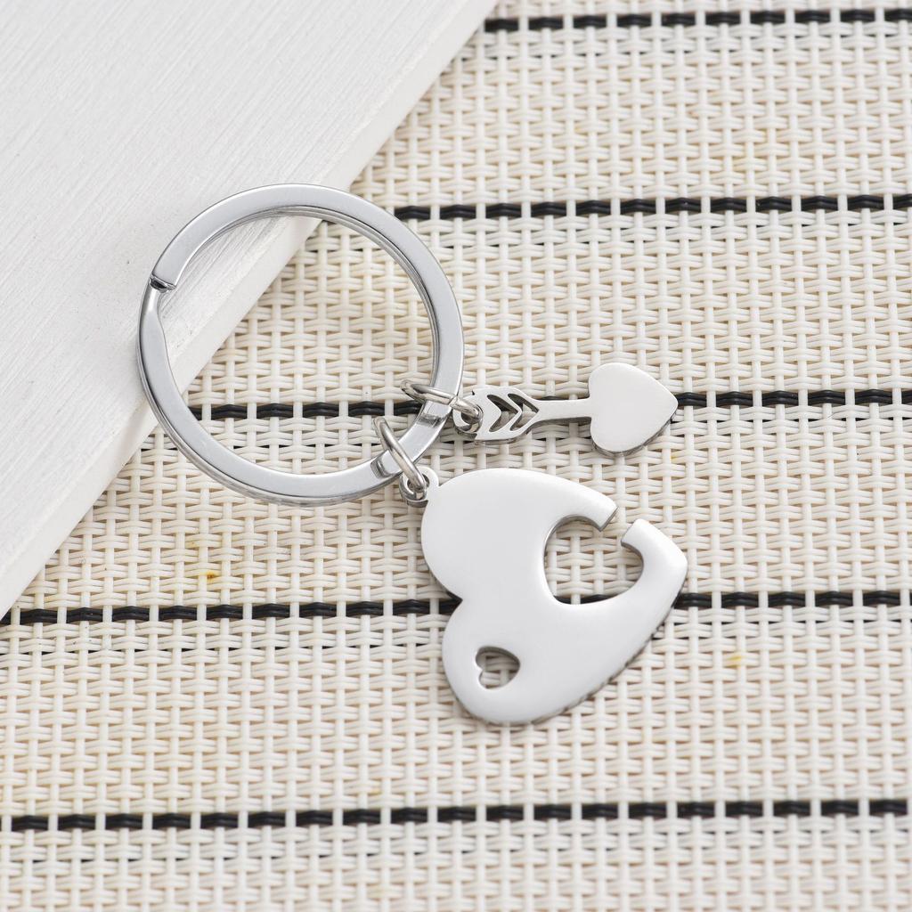 Hohles Liebespaar Edelstahl Schlüsselanhänger Amor Pfeil Design Mode Paar Anhänger Praktisches Romantisches Geschenk