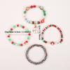 Christmas Charm Bracelet with Snowman, Tree, Santa, and Deer Pendants