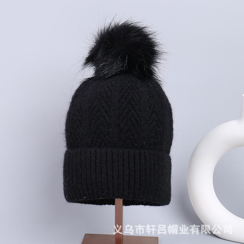 Thickened cold-proof and warm wool ball pullover hat autumn and winter European and American winter outdoor stacking hat knitted hat