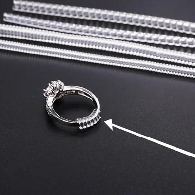 Juego de 4 herramientas reductoras de tamaño de anillo con resorte en espiral para ajustar anillos, tensor transparente invisible, herramienta de cambio de tamaño, protector de joyería