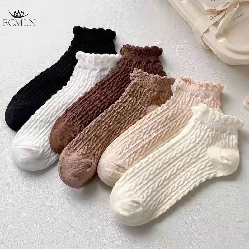 Chaussettes mignonnes respirantes à la cheville pour femmes Chaussettes solides Chaussettes décontractées à volants pour femmes Chaussettes d'équipage respirantes
