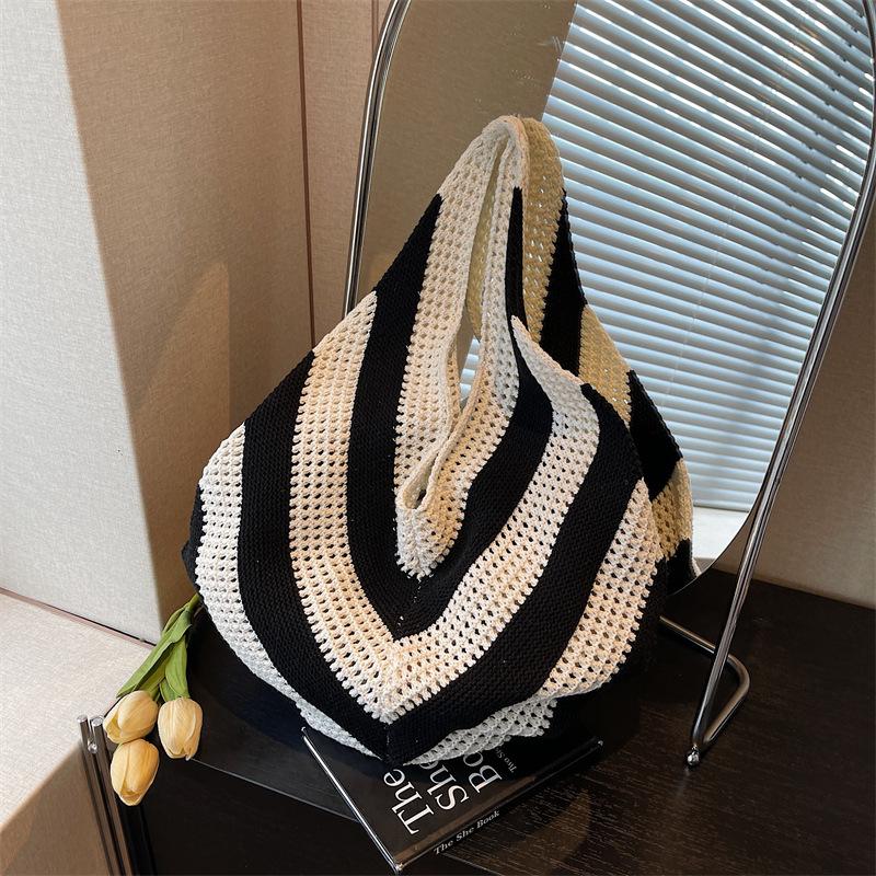 Niche woven lazy wind shoulder bag women's new holiday beach bag large-capacity commuter bag