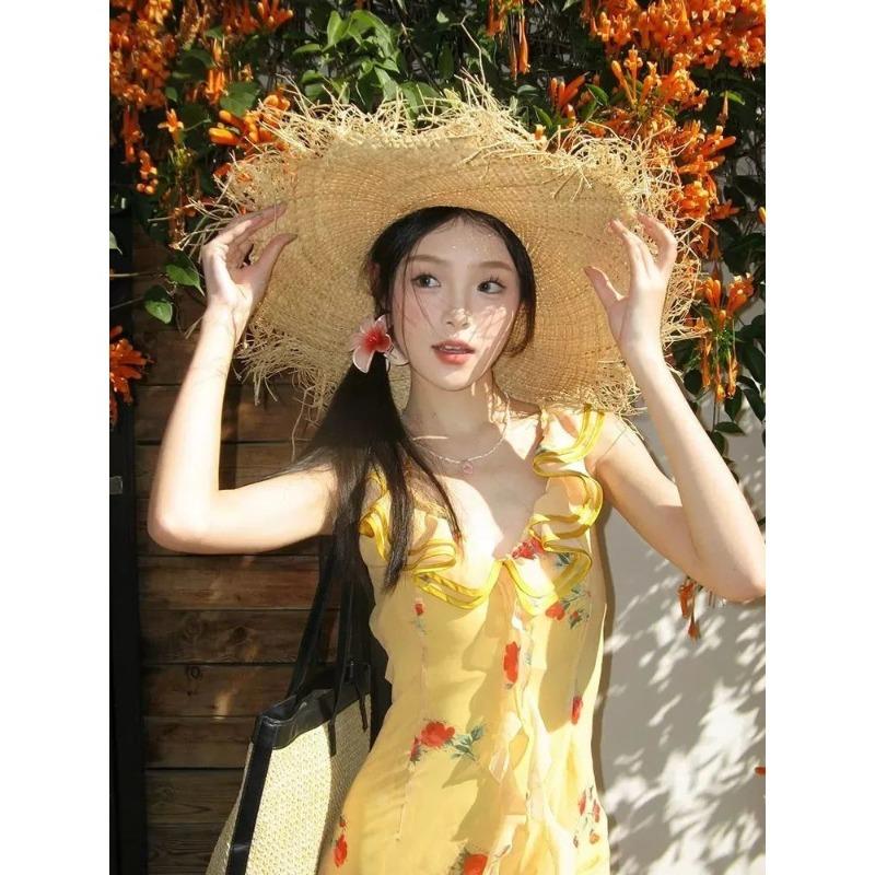 Yellow lotus leaf beautiful floral suspender dress women's summer vacation French summer temperament beach fishtail dress