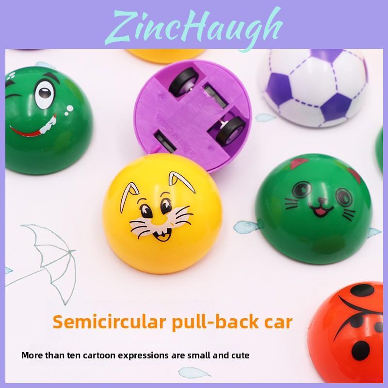 Mini-Aufziehspielzeug aus Kunststoff mit Cartoon-Ausdruck Halbkugel-Design für Kinder und Familienspaß
