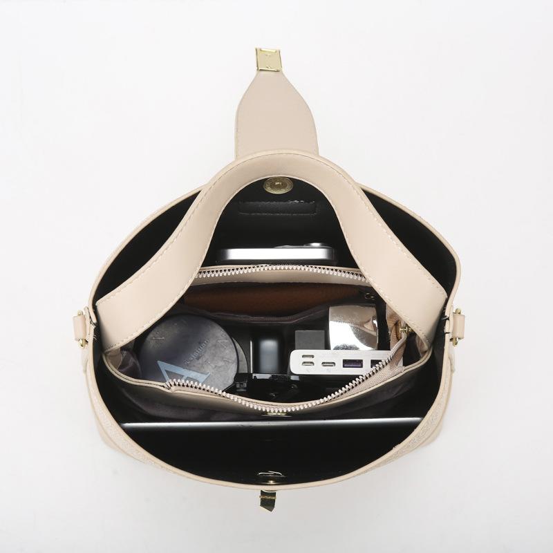 Large-capacity versatile bucket bag, commuter bag, simple and high-end women's bag, new shoulder portable messenger women's bag.