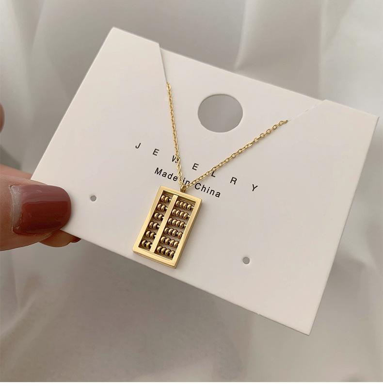 Ruyi Abacus Pendant Necklace: Rose Gold Plated Titanium Steel Chain for Women