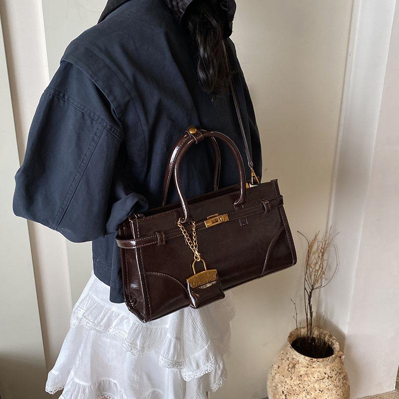 

Niche Fashion Oil Wax Leather Portable Refrigerated Retro Casual Shoulder Bag High-End Tote Женская сумка No small bag темно-коричневого