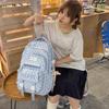 Schoolbag Korean ins Storm Point Three-piece set School bag for junior and high school girls Large capacity burden reduction Backpack
