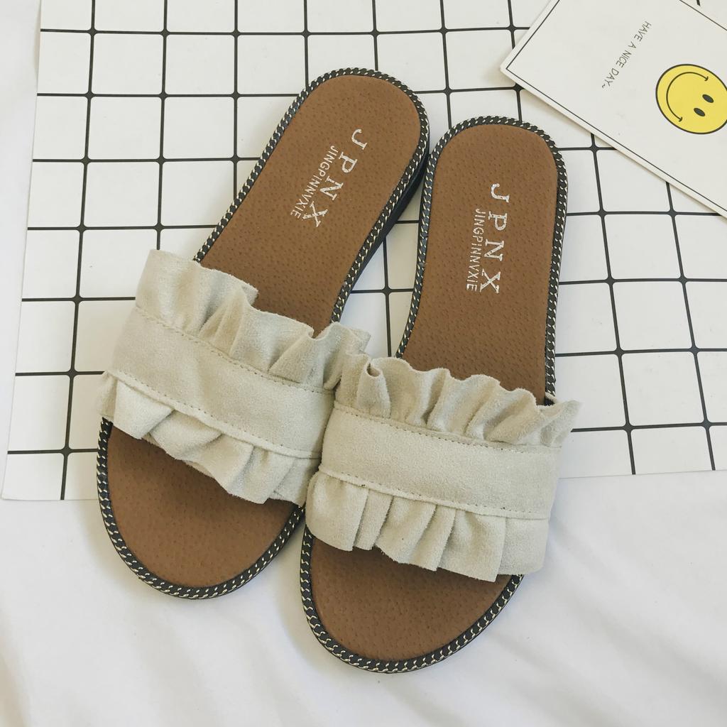 Frühling und Sommer neue coole Hausschuhe Damen koreanische Version Mode Pilzspitze Hausschuhe flacher Absatz Ein-Wort-Hausschuhe