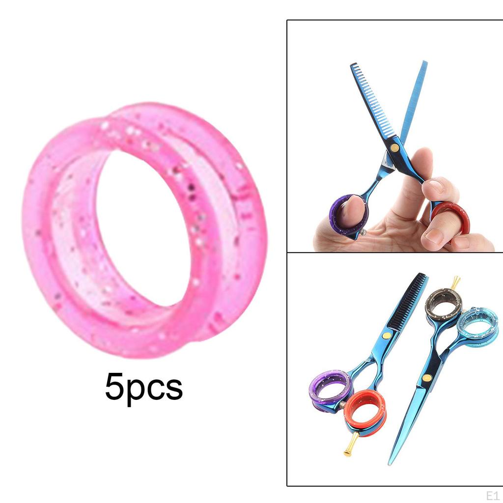 5-teiliges Scheren-Set mit Fingerringen, Griffeinsätzen und Zubehör für die Haarpflege.
