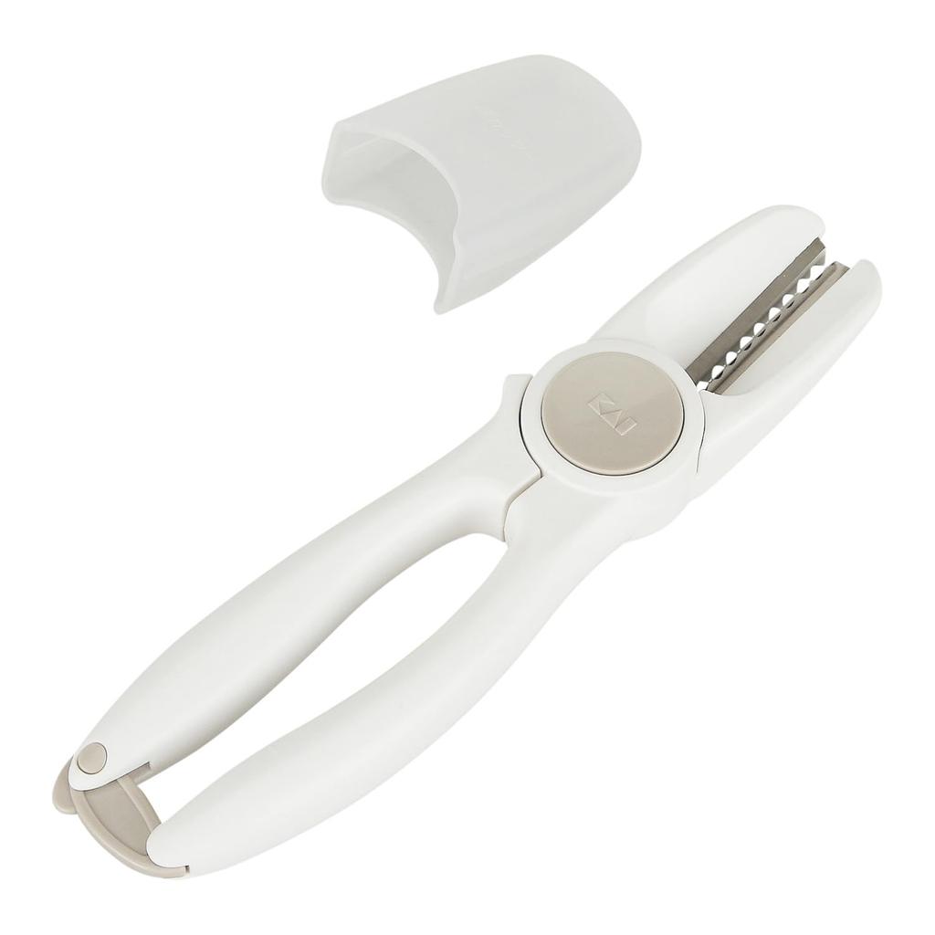 KAI Chestnut Cutter Removes raw and boiled chestnut skins and has a convenient cap for Made in - storage. Japan. DH8183.
