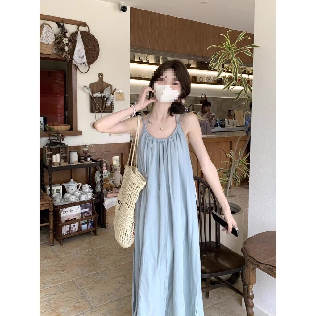Seaside vacation style blue suspender dress women's spring new loose backless strap A-word long dress ins trend