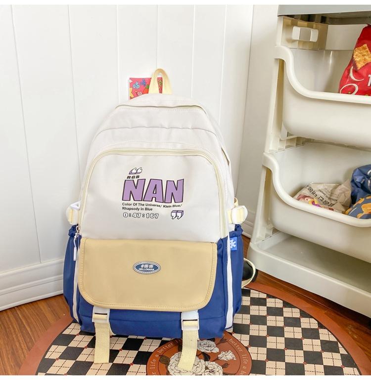 Contrasting large capacity student bag waterproof backpack high school student school bag Japanese backpack light weight reduction bag travel bag Single Pack