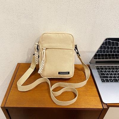 Beliebte kleine Tasche Damen Frühling neue Mode Canvas Umhängetasche leicht und exquisit Mini Messenger Handy-Tasche