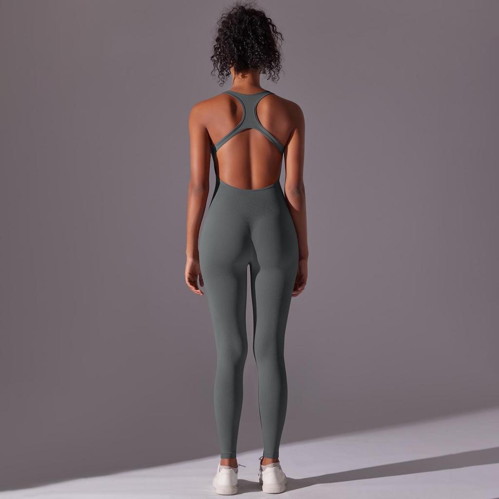 Sömlös enfärgad yogajumpsuit med öppen rygg