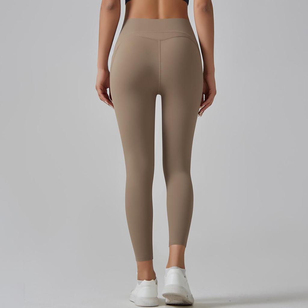 Women's High-Waisted Seamless Yoga Pants with Pockets - Quick-Dry, Tight-Fit, Brushed Fabric, Butt-Lifting Sportswear for Running & Fitness