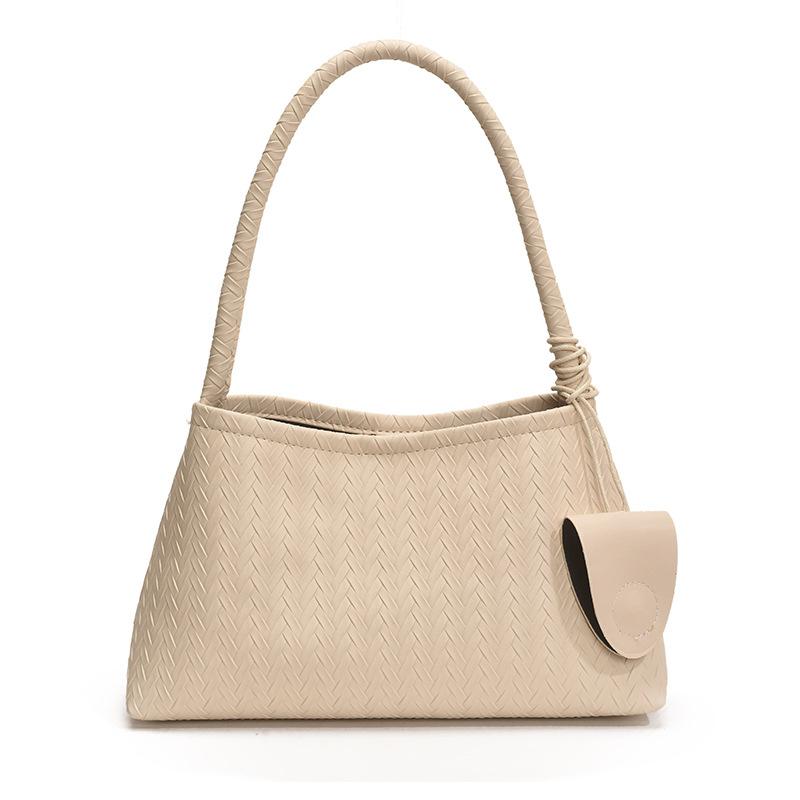 

French niche woven pattern underarm bag women s 2025 summer temperament high value commuting shoulder handbag