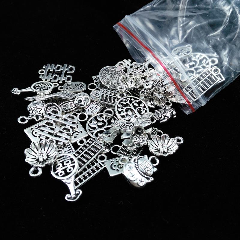 Tibetanisches Silber Schmuck-Set: 50g Gemischte Anhänger, Vintage Armband, Blumenbecher-Abstandshalterperlen für DIY Handgemachte Kreationen