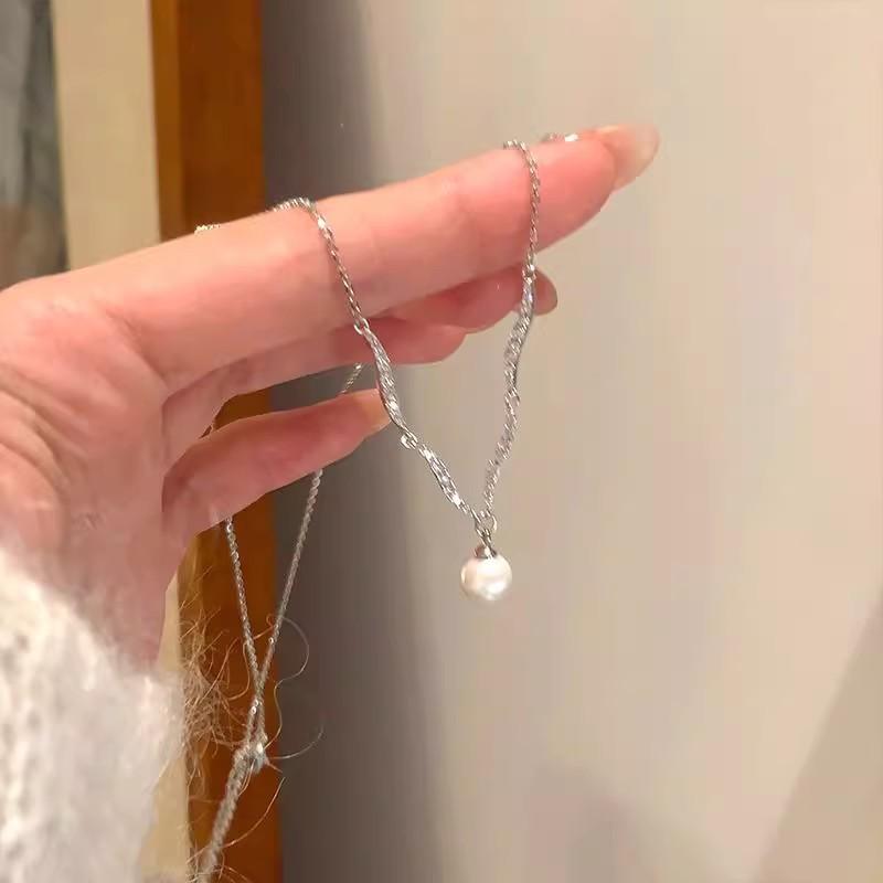 

Темперамент вспышка циркон волна жемчужная подвеска ключичная цепочка высокое чувство легкая роскошь нишевое ожерелье женская цепочка для свитера шейная цепочка аксессуары