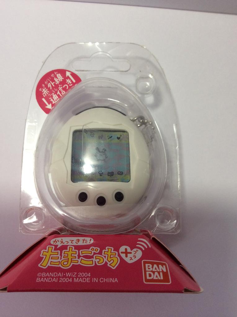 Tamagotchi Plus White Black Button Is Back