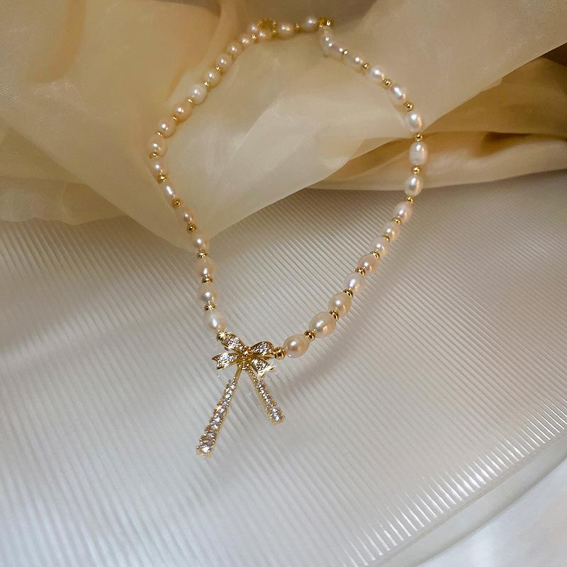 New Freshwater Pearl Necklace Personalized Zircon Bow Necklace French Retro Collarbone Chain Design Sense Necklace Women