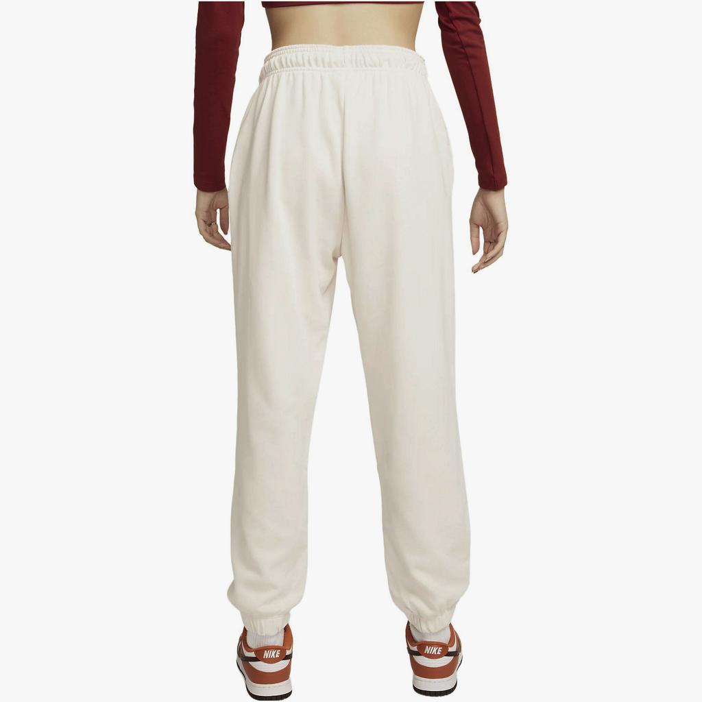 Nike Spodnie casualowe z mankietami i elastyczną talią z nadrukiem literowym Damskie doły Beżowy FQ0367-030
