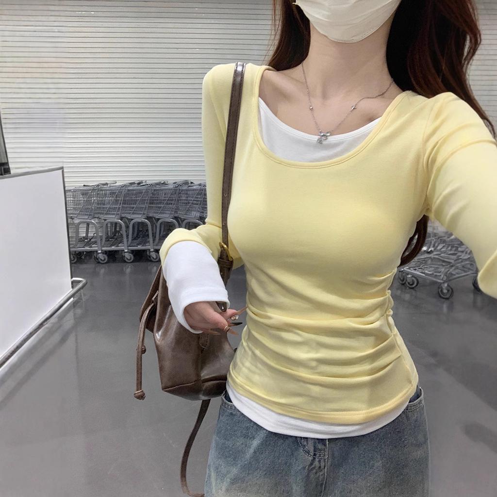 Design sense contrasting color fake two long-sleeved crew neck T-shirt women's spring and autumn Korean niche chic slim-fitting inner top