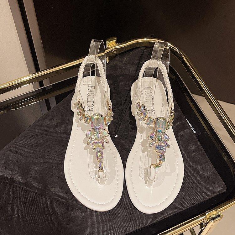 Sommer neue Zehensandalen Schulmädchen koreanische Version Feenstil Internet-Berühmtheit Mode römische Kneif-Strass-Flats Tide