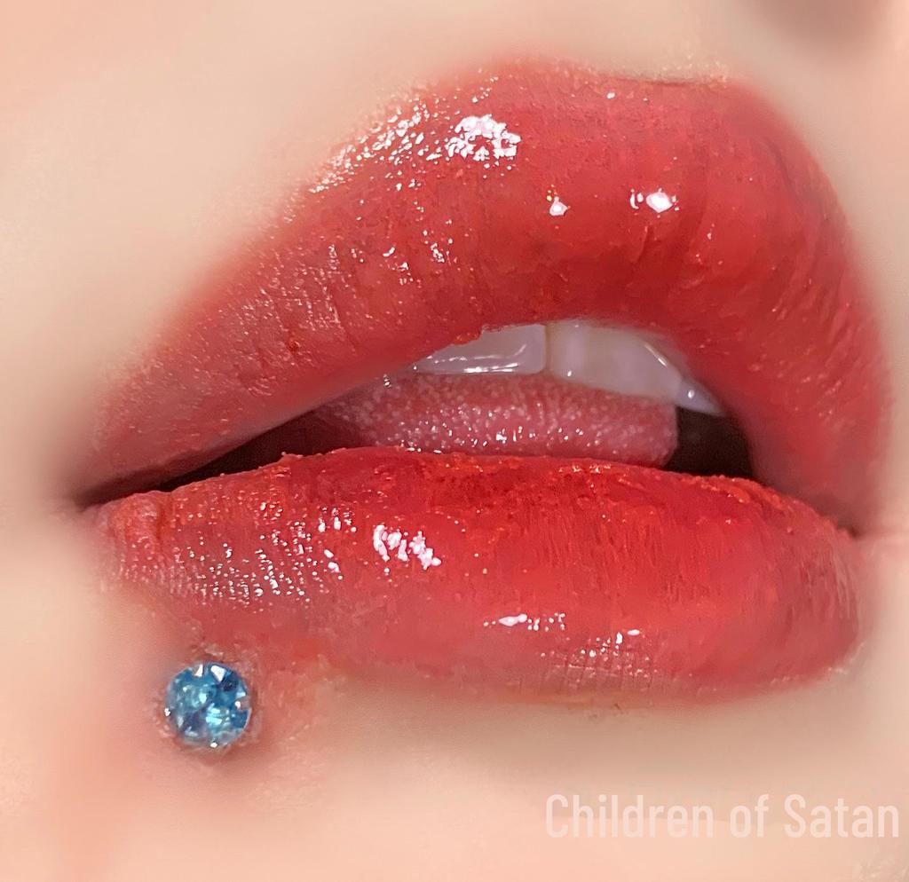 'Satan's Child: Luxury Diamond Lip and Ear Studs for Bold Women'