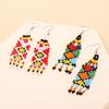 European and American ethnic style handmade rice bead fringed earrings, niche design sense vintage retro earrings