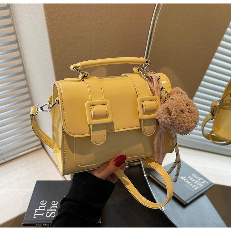 

Популярная в этом году маленькая женская сумка 2025 новая высококачественная текстура нишевый дизайн сумка-мессенджер маленькая сумка жёлтый