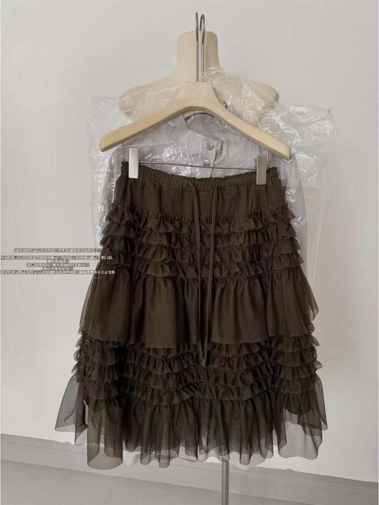 Spring 2026 Essential Korean Style Midi Skirt with Heavy Embroidery, Mesh Layers, and Lace-Up Hem.