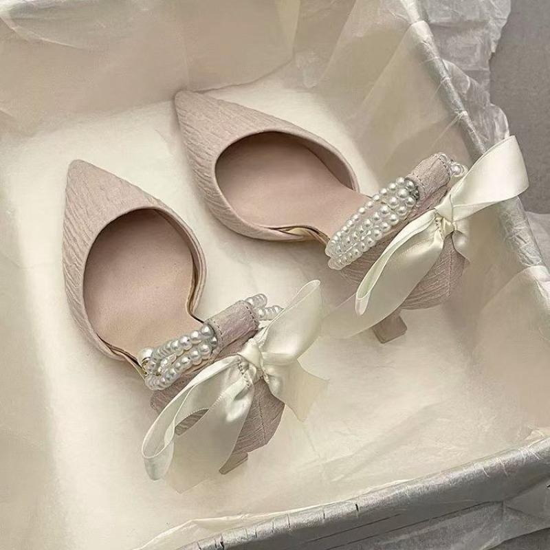 Fashion one-word strap high heels women's spring summer new pointed head stiletto bow bag head hollow sandals