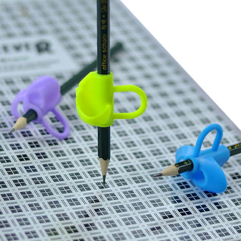 1 kus dětského držáku na tužku pro korekci psacího a držícího držení pera Nástroj Silikonový korektor psacího držení Kancelářské potřeby