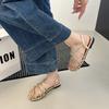 French Retro Ribbon Woven Hollow Open-toed Sandals Women's Summer 2025 New Versatile Flat-soled Roman Sandals