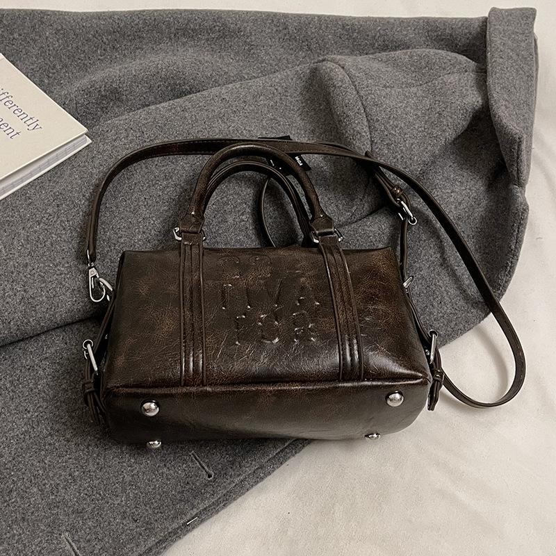 

Retro trend niche portable pillow bag women s versatile high-end sense fashion commuter messenger bag