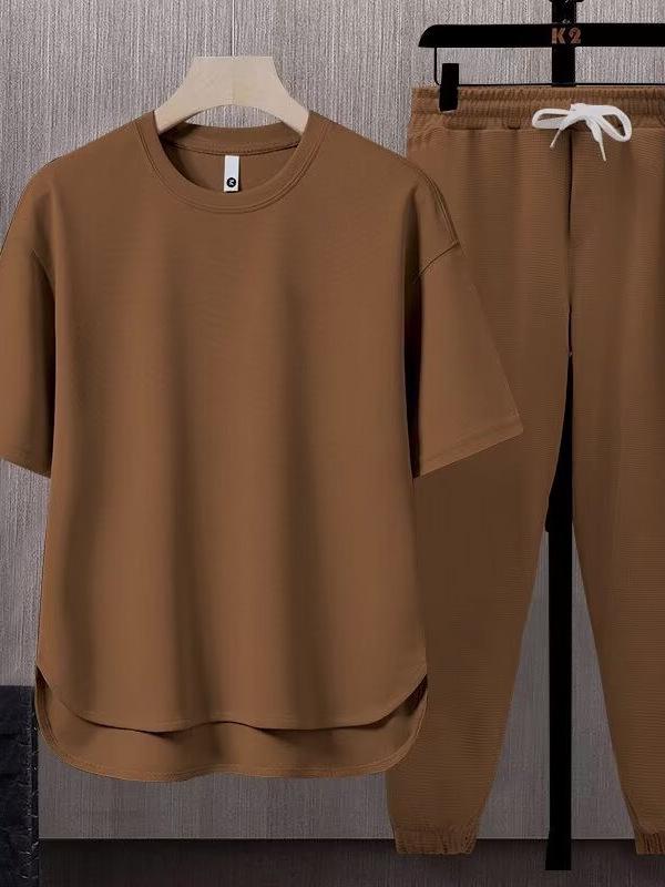 Set da uomo a due pezzi tinta unita tendenza giapponese: T-shirt a maniche corte e pantaloni lunghi (Estate 2025)