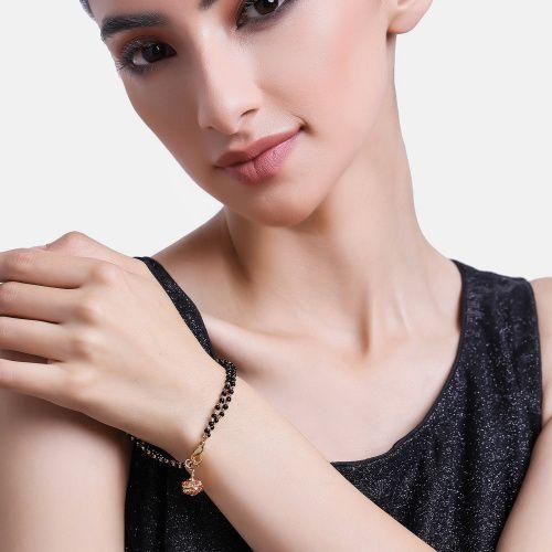 

Estele Gold Plated Beautiful Black Beads Bracelet with Ruby Stones for Women
