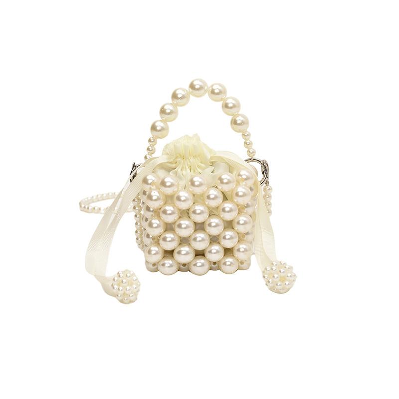 Daily commute imitation pearl woven hollow mini women lipstick earphone bag spring new shoulder messenger bag