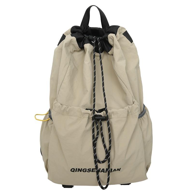 Solid color simple backpack, new drawstring outdoor, light sports and capacity, travel anti-splashing water-resistant wear-resistant and versatile
