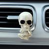 Creative car skull ornaments with the design of "see no evil, hear no evil, speak no evil", which are car interior decorations.