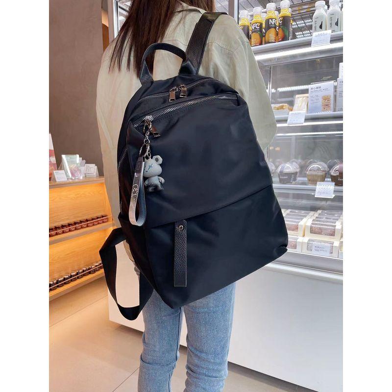 

Backpack Women s 2025 New Arrival Fashion Waterproof Oxford Cloth Backpack Student Schoolbag Computer Bag Large Capacity Travel Bag Pure black