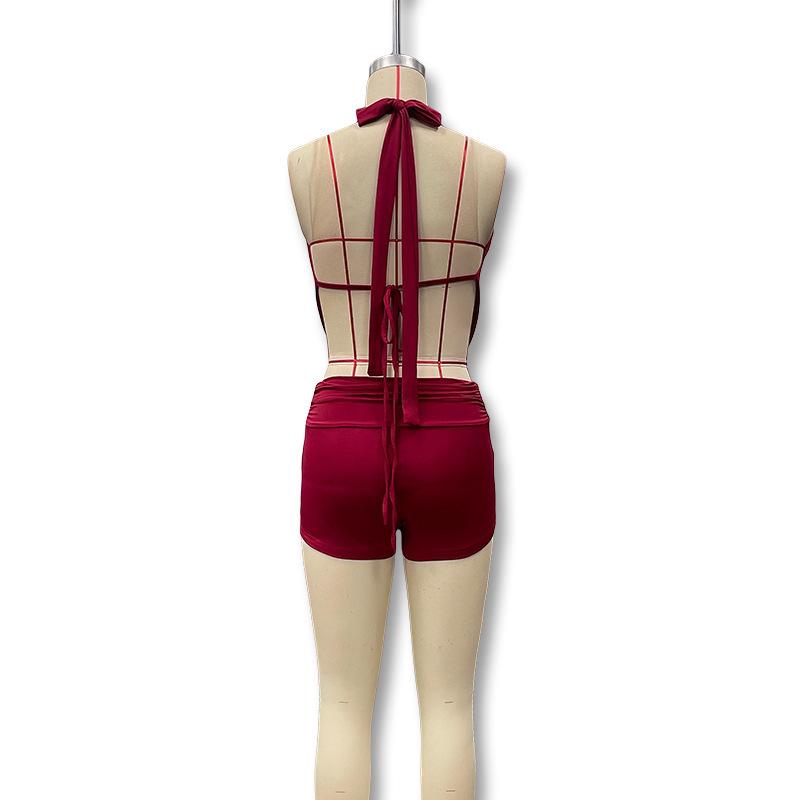 European & American Sexy Low-Cut Halter Backless Top with High-Waisted Ultra-Short Pants Two-Piece Set for Women.