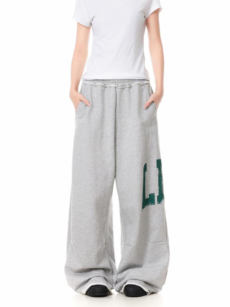 Damen Amerikanische Retro Sportliche Sweatpants mit Seitenbuchstaben-Print - Bodenlang, Lockere Passform, Elastischer Bund, Raw-Edge-Design