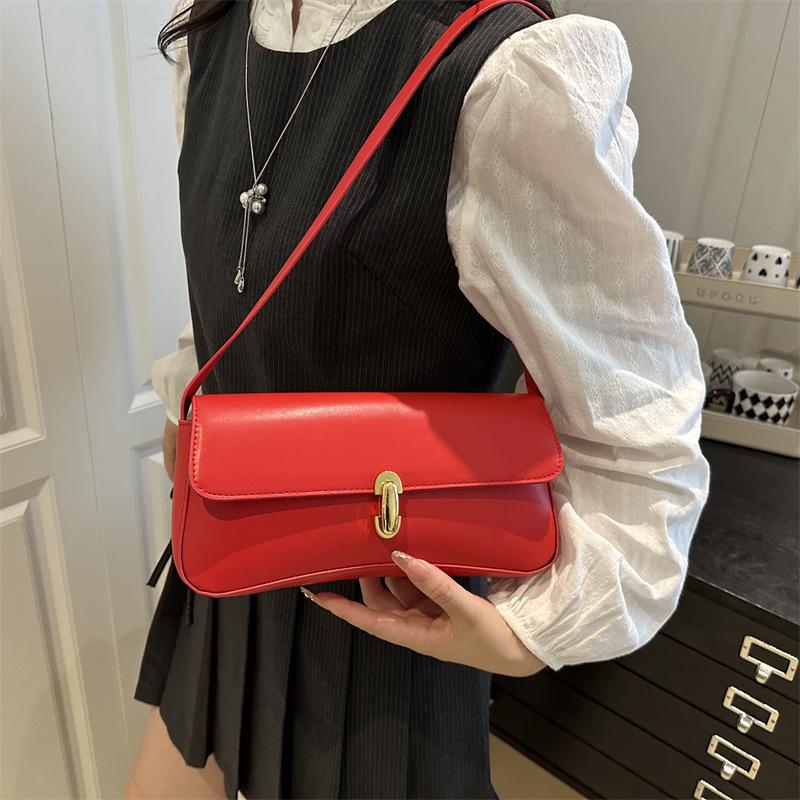 French personality trendy foreign style retro underarm portable shoulder bag underarm shoulder women's bag solid color 2025 new fashion