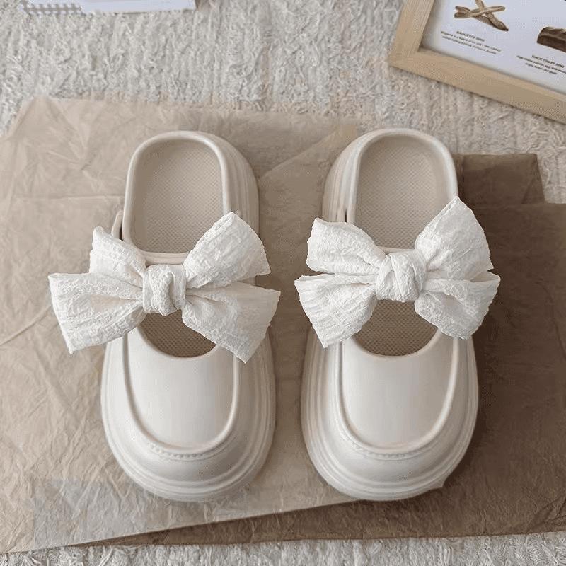 Retro high-end thick-soled 2025 new EVA bag head bow hole shoes women's summer non-slip outer sandals