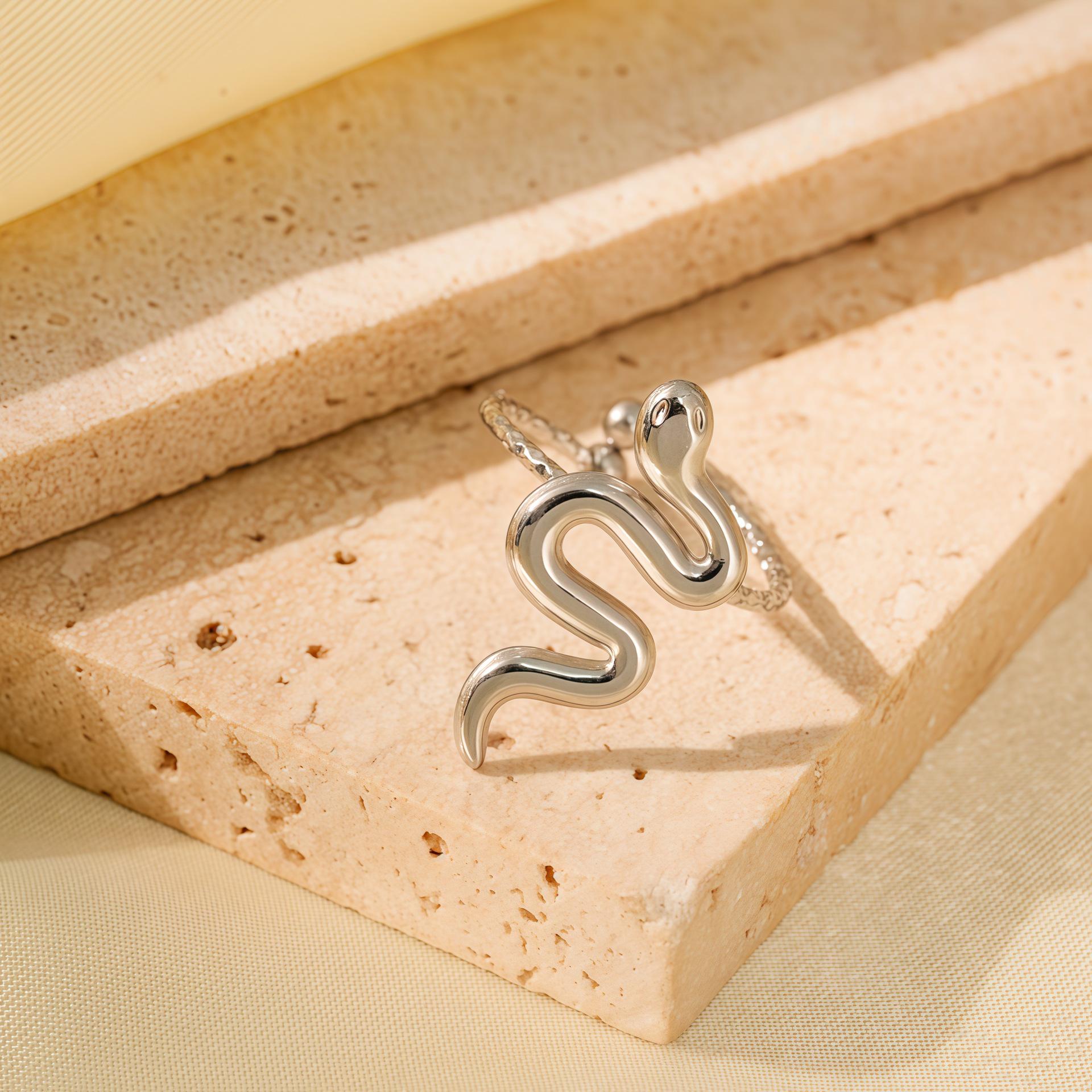 Elegant Snake-Shaped Geometric Titanium Steel Open Ring for Women – Non-Fading, Versatile Luxury Jewelry.
