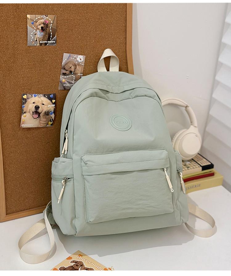 Fashionable Outdoor Ladies Backpack With Alphabet Decoration And Solid Color Design For Commuting