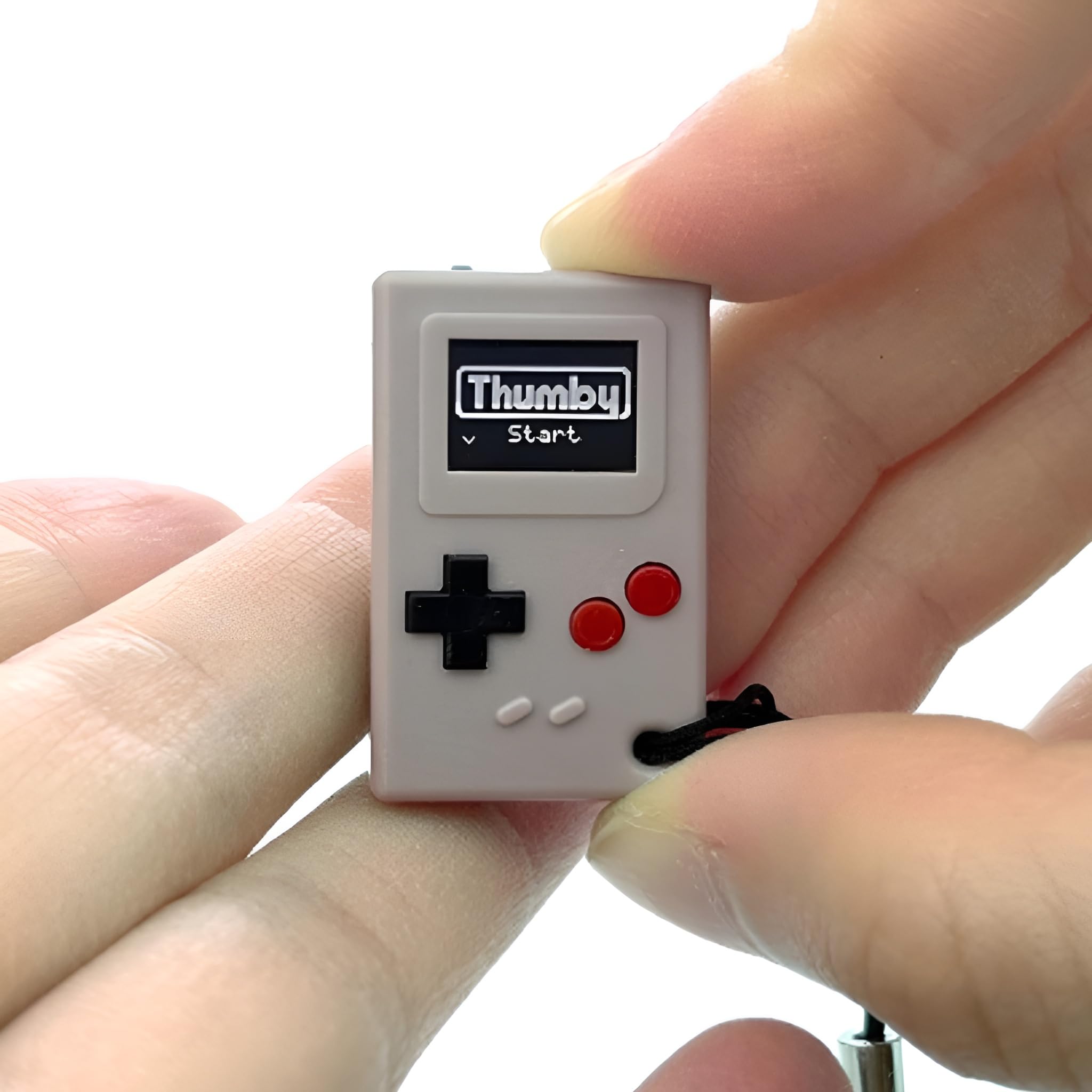 

TinyCircuits Thumby, найменша у світі міні-ігрова консоль, сумісна з брелоком, програмована, ретро-портативна гра, сіра [Автентична]