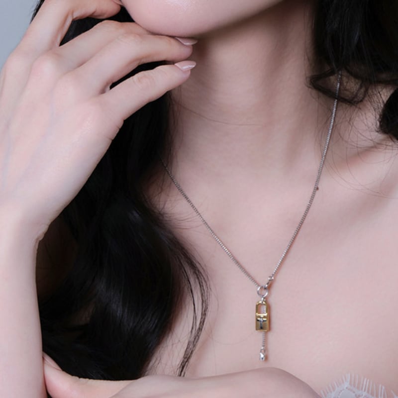 reve lock & cross two-tone drop necklace
